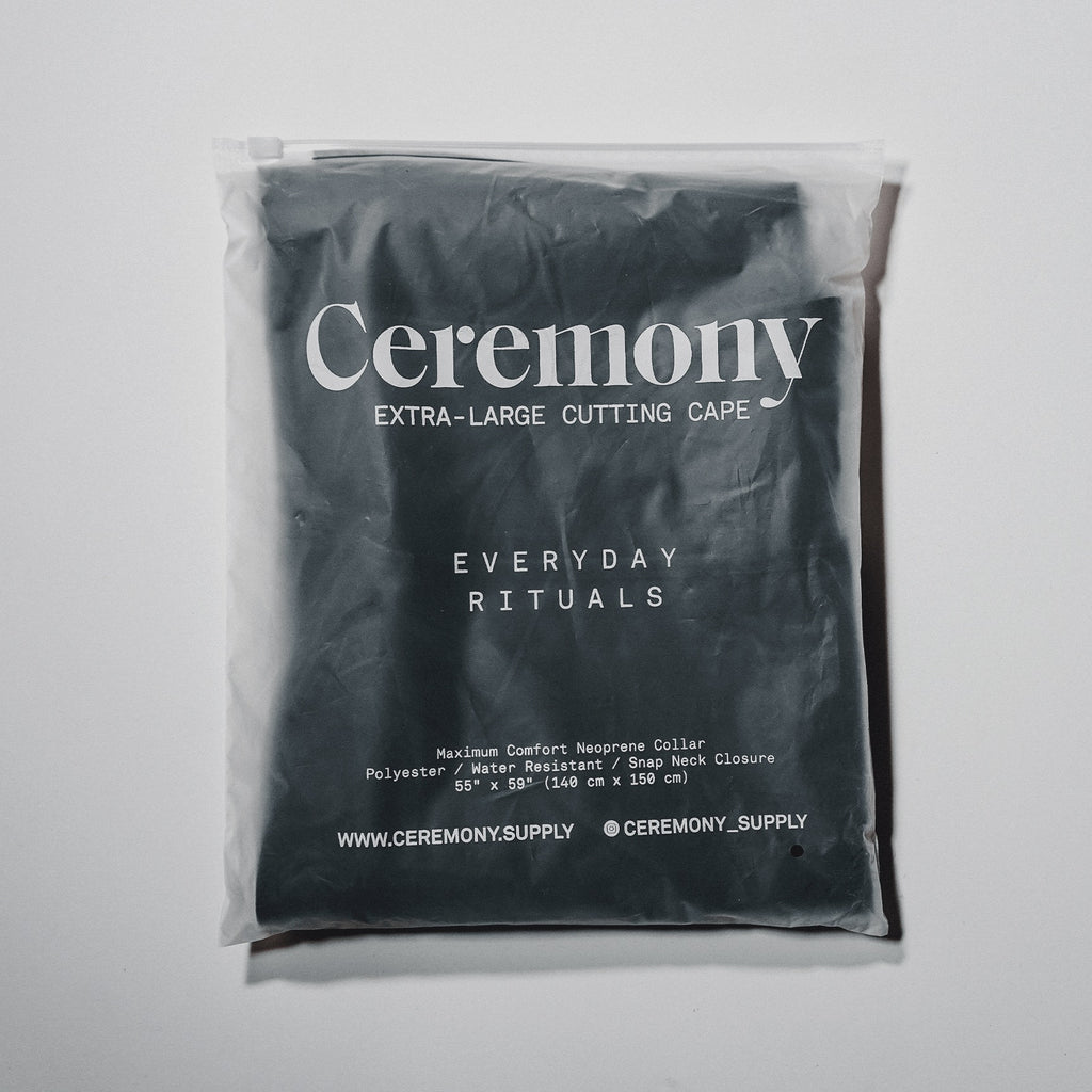 Black Ceremony Stylist Extra-Large Cutting Cape Packaged Featuring a Ceremony Logo